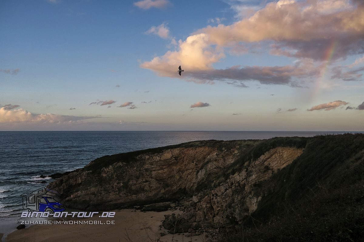 Sonne-Wolken-Regenbogen